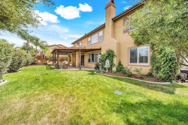 34056 Vandale Ct, Temecula, CA 92592 - back of house featuring a patio area, a chimney, and stucco siding