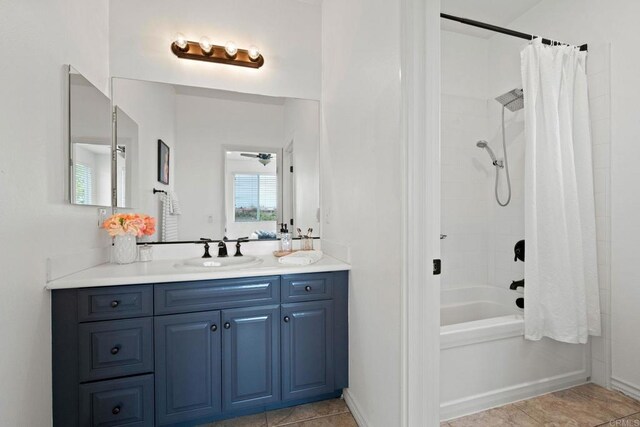 34056 Vandale Ct, Temecula, CA 92592 - bathroom featuring shower / bath combo with shower curtain, vanity, tile patterned floors, and baseboards