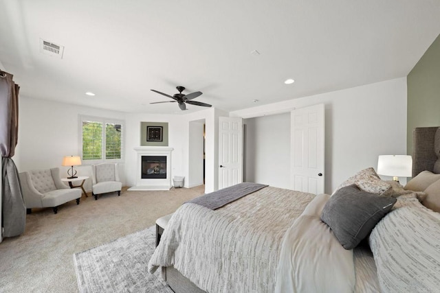 34056 Vandale Ct, Temecula, CA 92592 - carpeted bedroom with recessed lighting, ceiling fan, and a glass covered fireplace