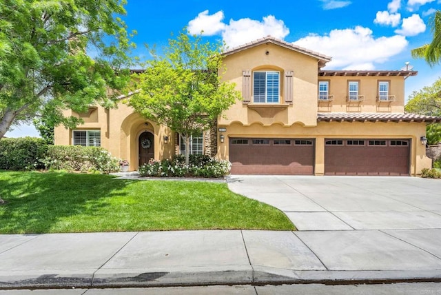 34056 Vandale Ct, Temecula, CA 92592 - mediterranean / spanish home with stucco siding, a garage, concrete driveway, and a front yard