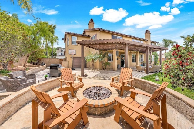 34056 Vandale Ct, Temecula, CA 92592 - rear view of property featuring an outdoor living space with a fire pit, a pergola, a patio, stucco siding, and fence