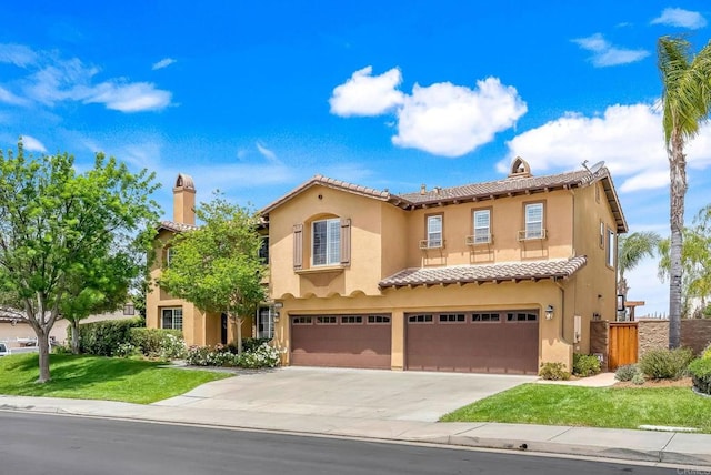 34056 Vandale Ct, Temecula, CA 92592 - mediterranean / spanish home with a tile roof, an attached garage, concrete driveway, and stucco siding