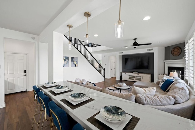34056 Vandale Ct, Temecula, CA 92592 - living room with stairway, a ceiling fan, dark wood-style flooring, recessed lighting, and a fireplace