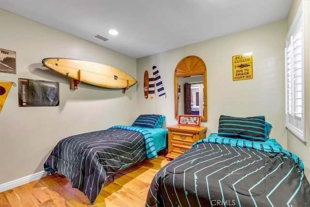 33441 N Spinnaker Dr N, Dana Point, CA 92629 - bedroom with wood finished floors and baseboards