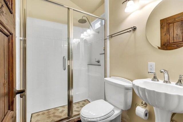 33441 N Spinnaker Dr N, Dana Point, CA 92629 - bathroom with toilet, a sink, and a shower stall