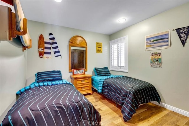 33441 N Spinnaker Dr N, Dana Point, CA 92629 - bedroom featuring wood finished floors and baseboards