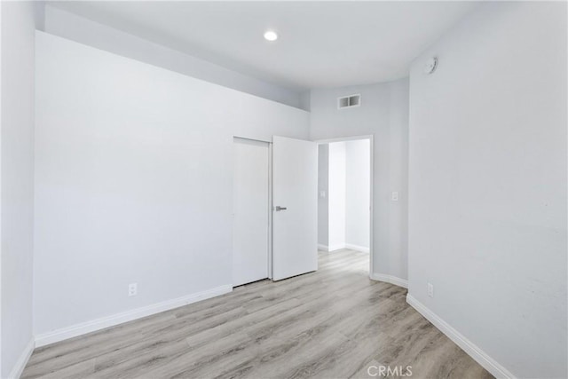 72 S Greenwood Ave Unit 3, Pasadena, CA 91107 - spare room with wood finished floors, baseboards, recessed lighting, and a smoke detector