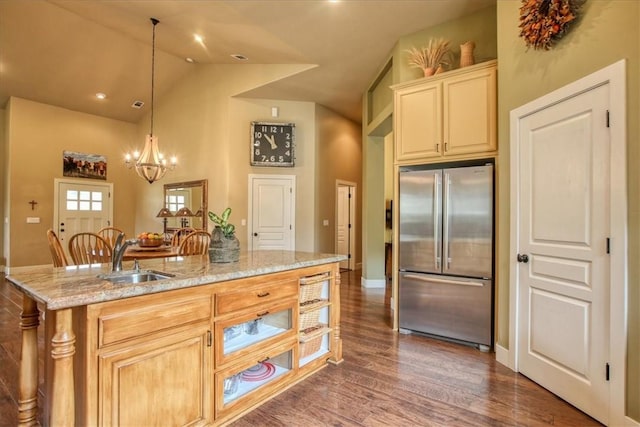 7550 Mary Hall Rd, Arroyo Grande, CA 93420 - kitchen featuring high quality fridge, a sink, light stone counters, decorative light fixtures, and dark wood finished floors