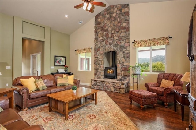 7550 Mary Hall Rd, Arroyo Grande, CA 93420 - living room featuring wood finished floors, high vaulted ceiling, ceiling fan, a wood stove, and plenty of natural light