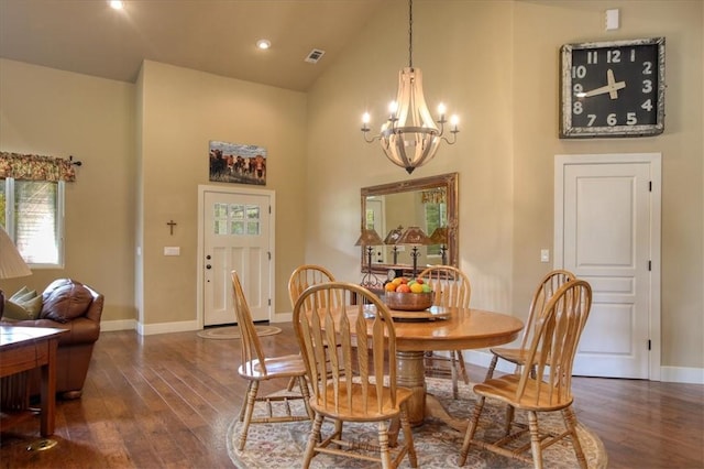 7550 Mary Hall Rd, Arroyo Grande, CA 93420 - dining area with dark wood-style floors, a chandelier, baseboards, and high vaulted ceiling