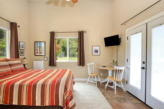 7550 Mary Hall Rd, Arroyo Grande, CA 93420 - bedroom with french doors, a towering ceiling, multiple windows, and baseboards