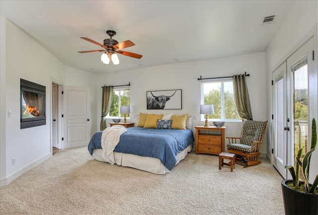 7550 Mary Hall Rd, Arroyo Grande, CA 93420 - bedroom featuring access to exterior, light colored carpet, ceiling fan, and baseboards