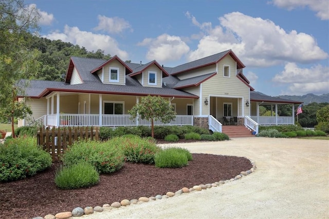7550 Mary Hall Rd, Arroyo Grande, CA 93420 - farmhouse with a porch, curved driveway, and stone siding
