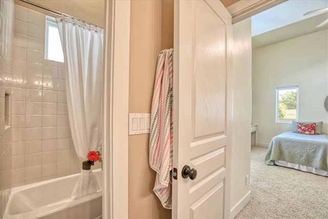 7550 Mary Hall Rd, Arroyo Grande, CA 93420 - ensuite bathroom with shower / bathtub combination with curtain and baseboards