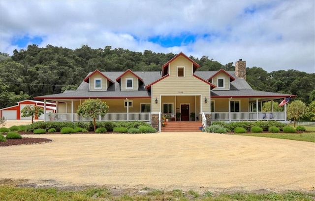 7550 Mary Hall Rd, Arroyo Grande, CA 93420 - farmhouse-style home featuring covered porch and a chimney