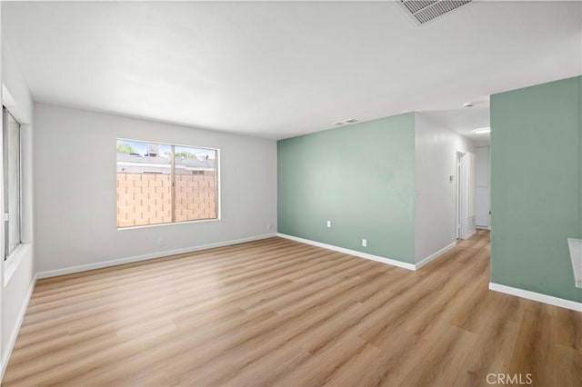 3316 Roxbury St, Rosamond, CA 93505 - unfurnished room featuring light wood-style flooring and baseboards