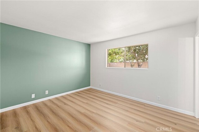 3316 Roxbury St, Rosamond, CA 93505 - unfurnished room featuring light wood-style flooring and baseboards