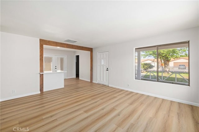 3316 Roxbury St, Rosamond, CA 93505 - unfurnished living room featuring french doors and light wood finished floors