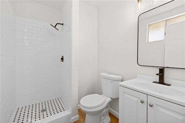 3316 Roxbury St, Rosamond, CA 93505 - bathroom featuring a shower stall, toilet, vanity, and wood finished floors