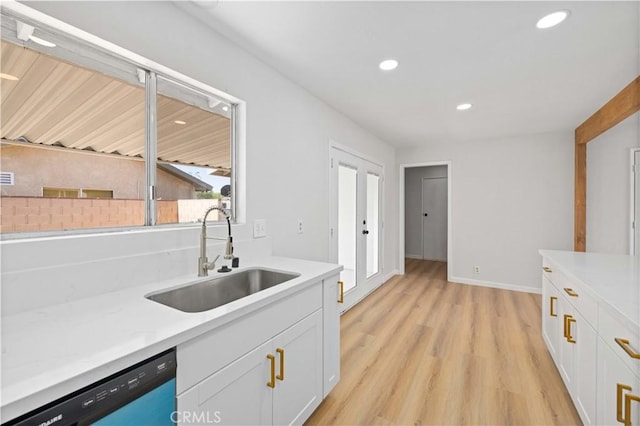 3316 Roxbury St, Rosamond, CA 93505 - kitchen featuring a sink, dishwashing machine, recessed lighting, white cabinetry, and light wood finished floors