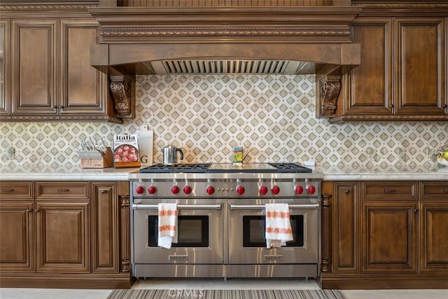 35 Shoreline Dr, Dana Point, CA 92629 - kitchen with range with two ovens, light countertops, and premium range hood