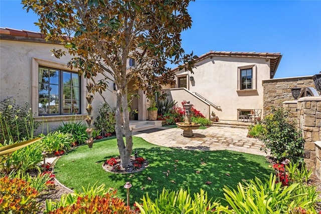 35 Shoreline Dr, Dana Point, CA 92629 - back of property featuring stucco siding, a patio area, and a yard