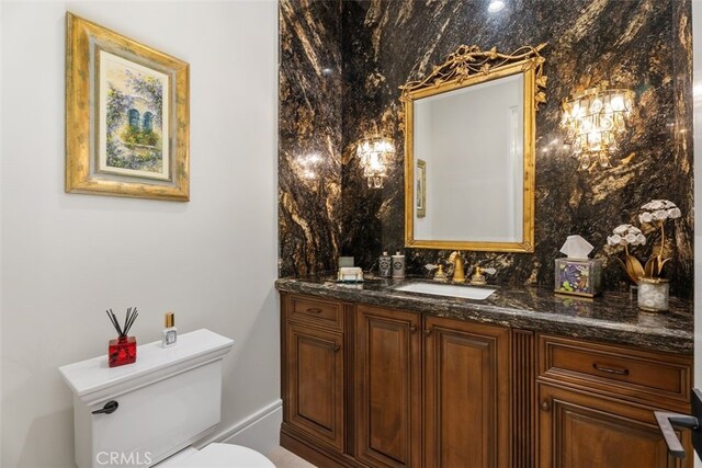 35 Shoreline Dr, Dana Point, CA 92629 - bathroom featuring toilet, vanity, and decorative backsplash