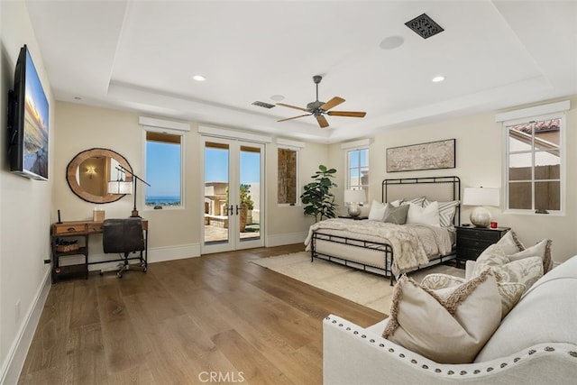 35 Shoreline Dr, Dana Point, CA 92629 - bedroom featuring a tray ceiling, access to outside, french doors, recessed lighting, and wood finished floors