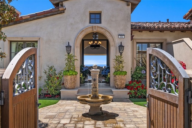 35 Shoreline Dr, Dana Point, CA 92629 - view of exterior entry featuring stucco siding and french doors