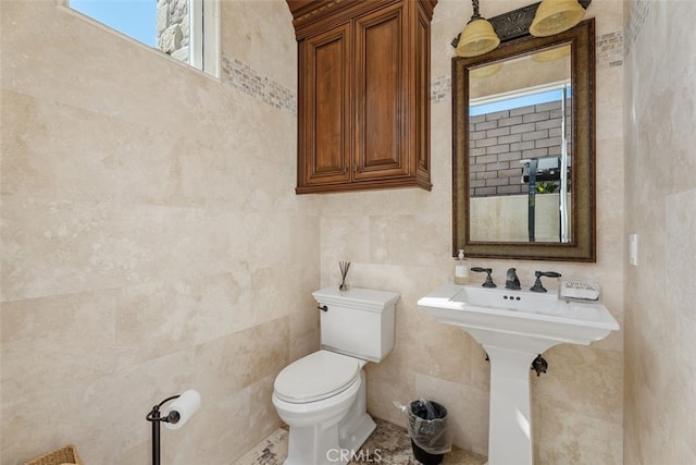 35 Shoreline Dr, Dana Point, CA 92629 - half bathroom with toilet, plenty of natural light, and tile walls