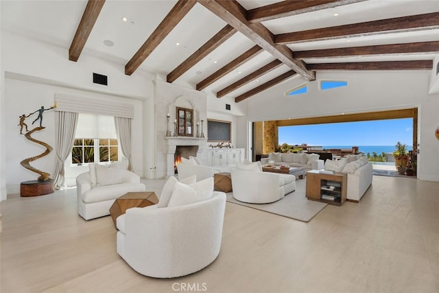 35 Shoreline Dr, Dana Point, CA 92629 - living room featuring beam ceiling, high vaulted ceiling, healthy amount of natural light, a fireplace, and wood finished floors