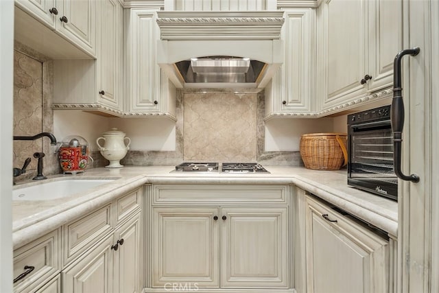 35 Shoreline Dr, Dana Point, CA 92629 - kitchen featuring stainless steel gas stovetop, backsplash, light countertops, a sink, and cream cabinets