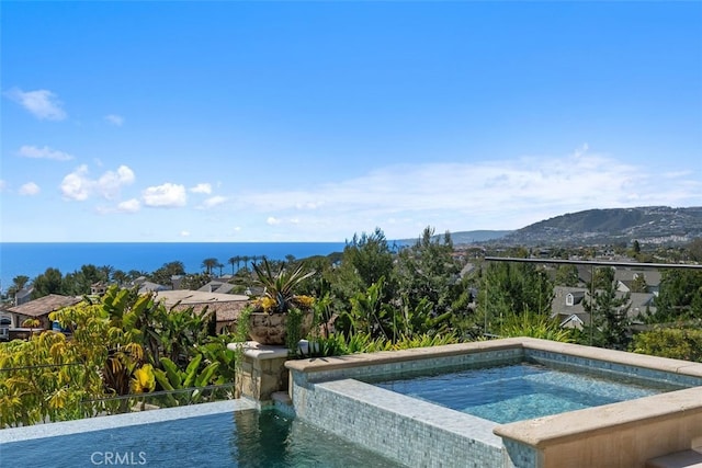 35 Shoreline Dr, Dana Point, CA 92629 - view of swimming pool with a pool with connected hot tub and a mountain view