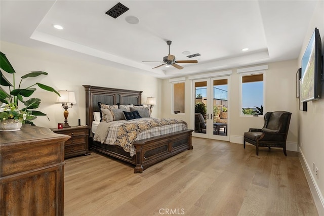 35 Shoreline Dr, Dana Point, CA 92629 - bedroom featuring a raised ceiling, french doors, access to outside, light wood-style floors, and recessed lighting
