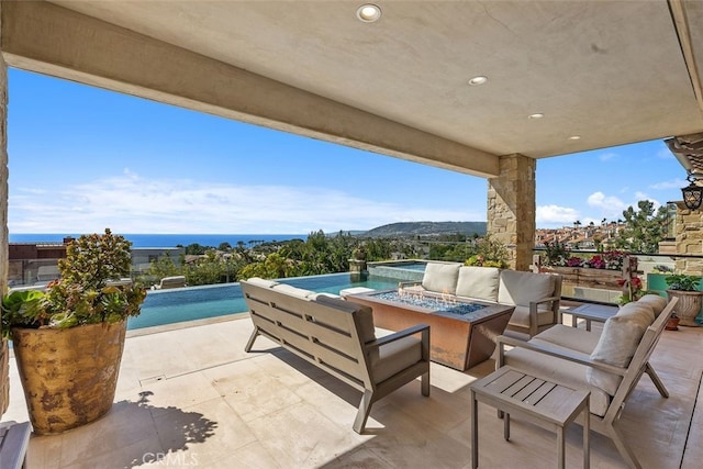 35 Shoreline Dr, Dana Point, CA 92629 - view of patio featuring an outdoor living space, an infinity pool, and a mountain view