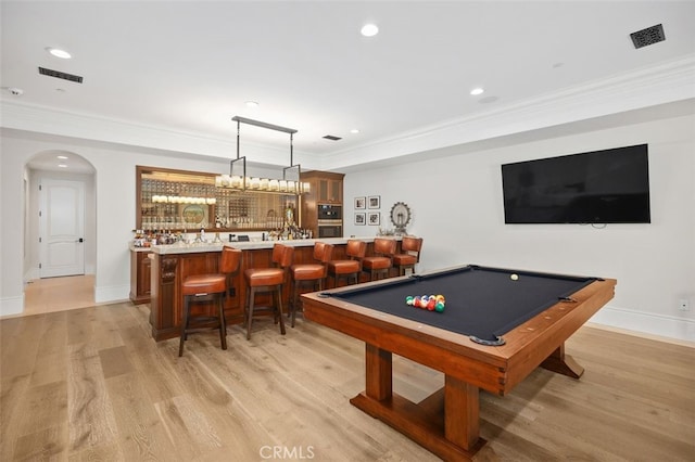 35 Shoreline Dr, Dana Point, CA 92629 - recreation room featuring bar with sink, crown molding, light wood-style flooring, arched walkways, and billiards table