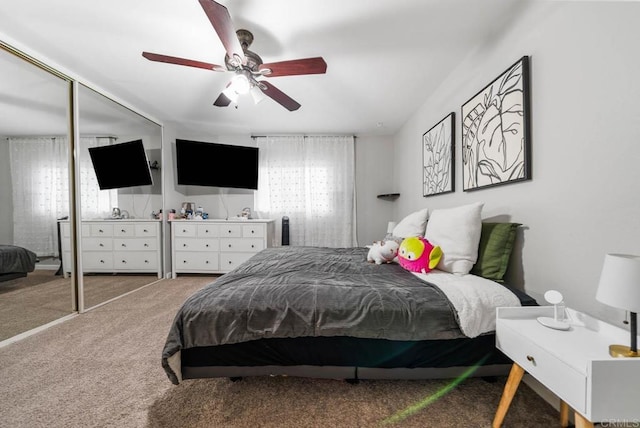 carpeted bedroom featuring a ceiling fan