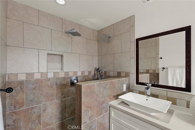 2405 Marshallfield Ln Unit B, Redondo Beach, CA 90278 - bathroom featuring a tile shower, tile walls, and vanity