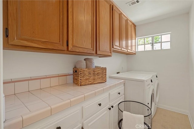 2405 Marshallfield Ln Unit B, Redondo Beach, CA 90278 - washroom featuring cabinet space, washing machine and clothes dryer, and baseboards
