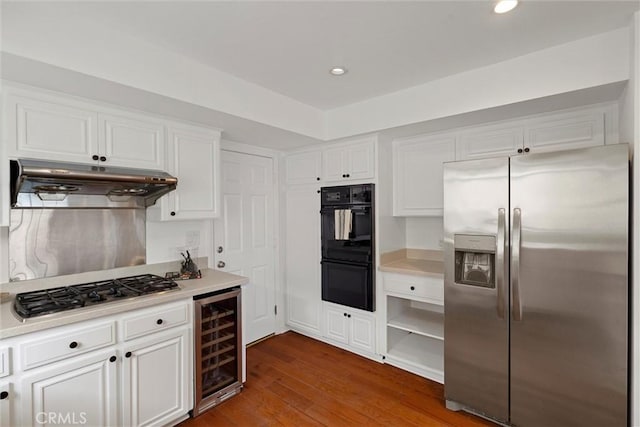 2405 Marshallfield Ln Unit B, Redondo Beach, CA 90278 - kitchen with appliances with stainless steel finishes, beverage cooler, under cabinet range hood, light countertops, and recessed lighting