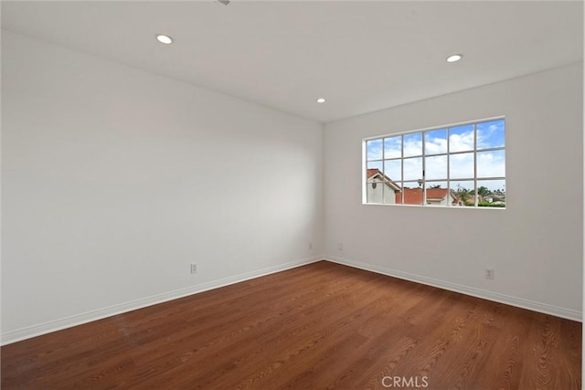 2405 Marshallfield Ln Unit B, Redondo Beach, CA 90278 - empty room with dark wood-style floors, baseboards, and recessed lighting