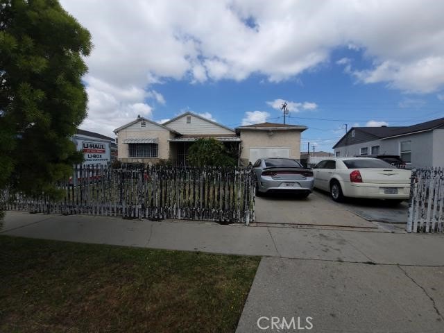 1307 S Grandee Ave, Compton, CA 90220 - view of front of property featuring driveway and a fenced front yard
