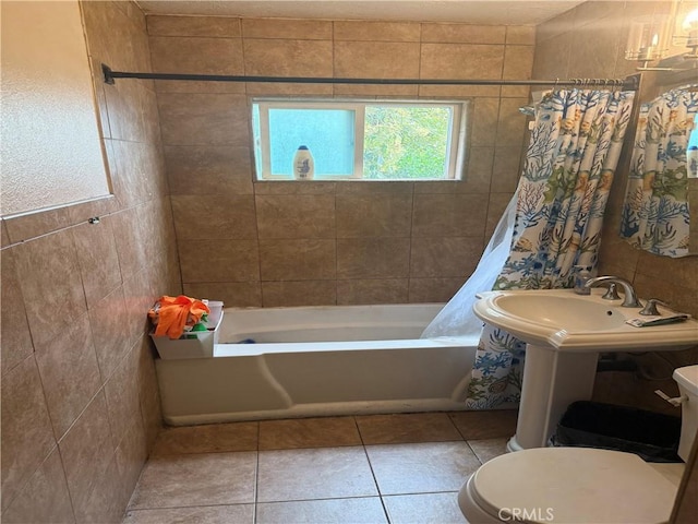 106 N Encina Ave, Rialto, CA 92376 - bathroom with toilet, shower / bathtub combination with curtain, and tile patterned flooring