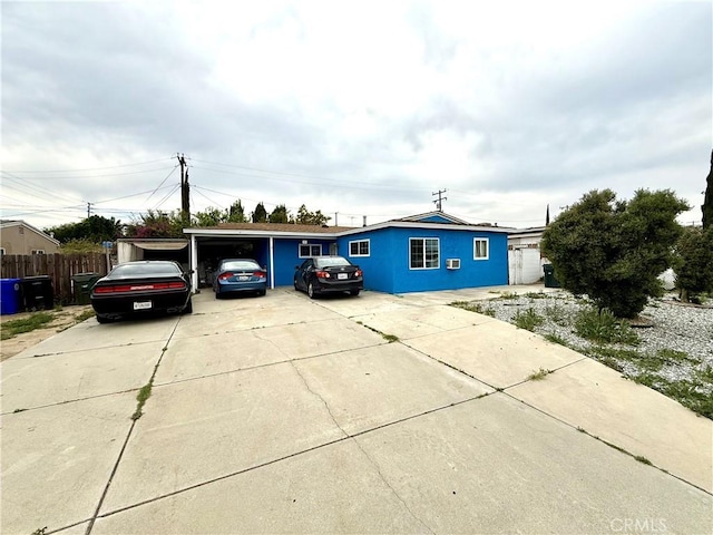 106 N Encina Ave, Rialto, CA 92376 - ranch-style house with concrete driveway and fence