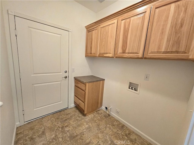 225 Sparrow Ct, Red Bluff, CA 96080 - washroom with hookup for a washing machine, cabinet space, baseboards, stone finish floors, and electric dryer hookup