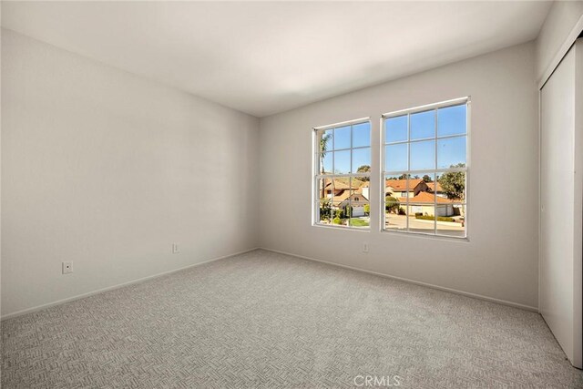 13639 Meadow Crest Dr, Chino Hills, CA 91709 - spare room featuring carpet flooring and baseboards