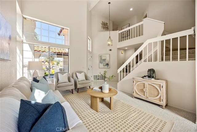 13639 Meadow Crest Dr, Chino Hills, CA 91709 - carpeted living room featuring stairs and a towering ceiling