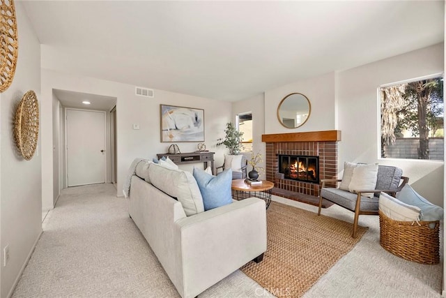 13639 Meadow Crest Dr, Chino Hills, CA 91709 - living room with a fireplace, light colored carpet, and baseboards