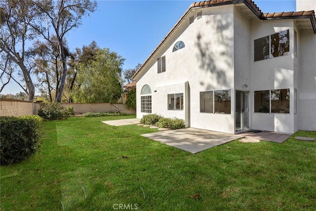 13639 Meadow Crest Dr, Chino Hills, CA 91709 - rear view of property featuring stucco siding, a patio area, and a tile roof