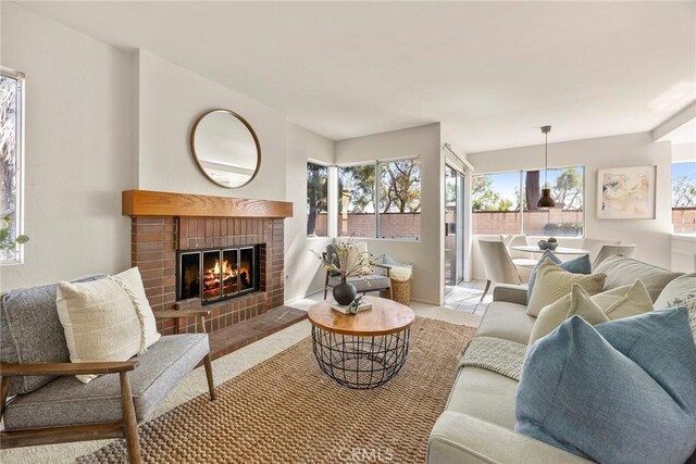 13639 Meadow Crest Dr, Chino Hills, CA 91709 - living area with a brick fireplace